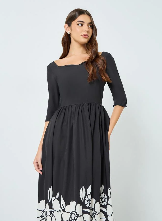 ستايلي فستان ميدي بحافة واسعة بطبعة أزهار